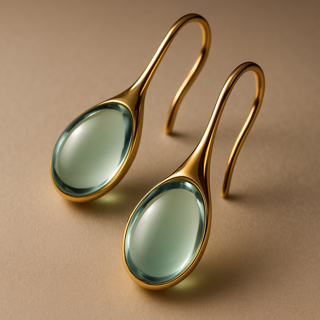 Hängende Kristallohrringe in Gold und Silber